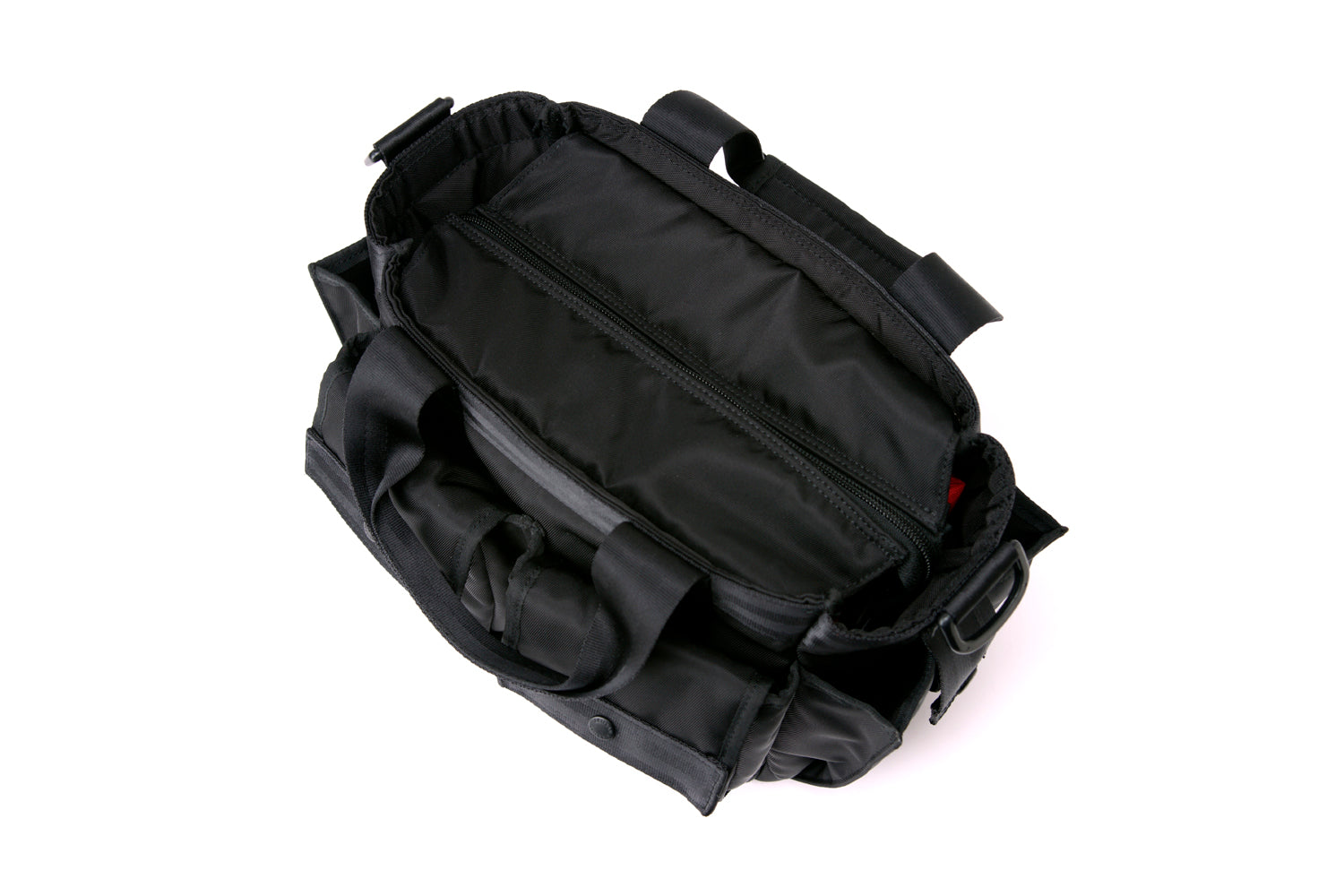 Shoulder-tote-type camera bag with a wide opening.