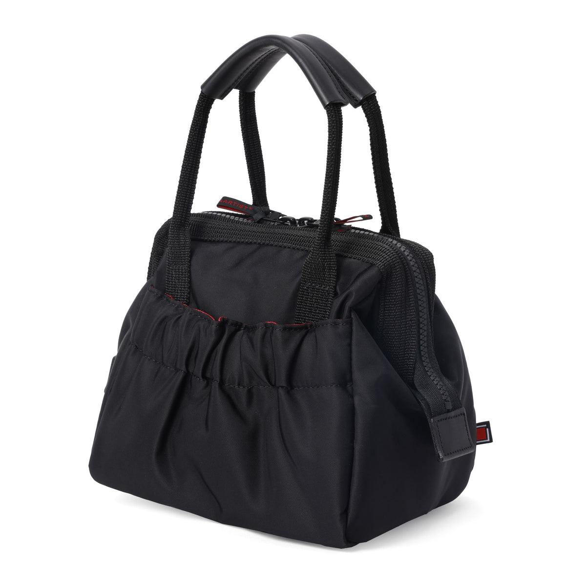Compact handbag with a wide clasp opening
